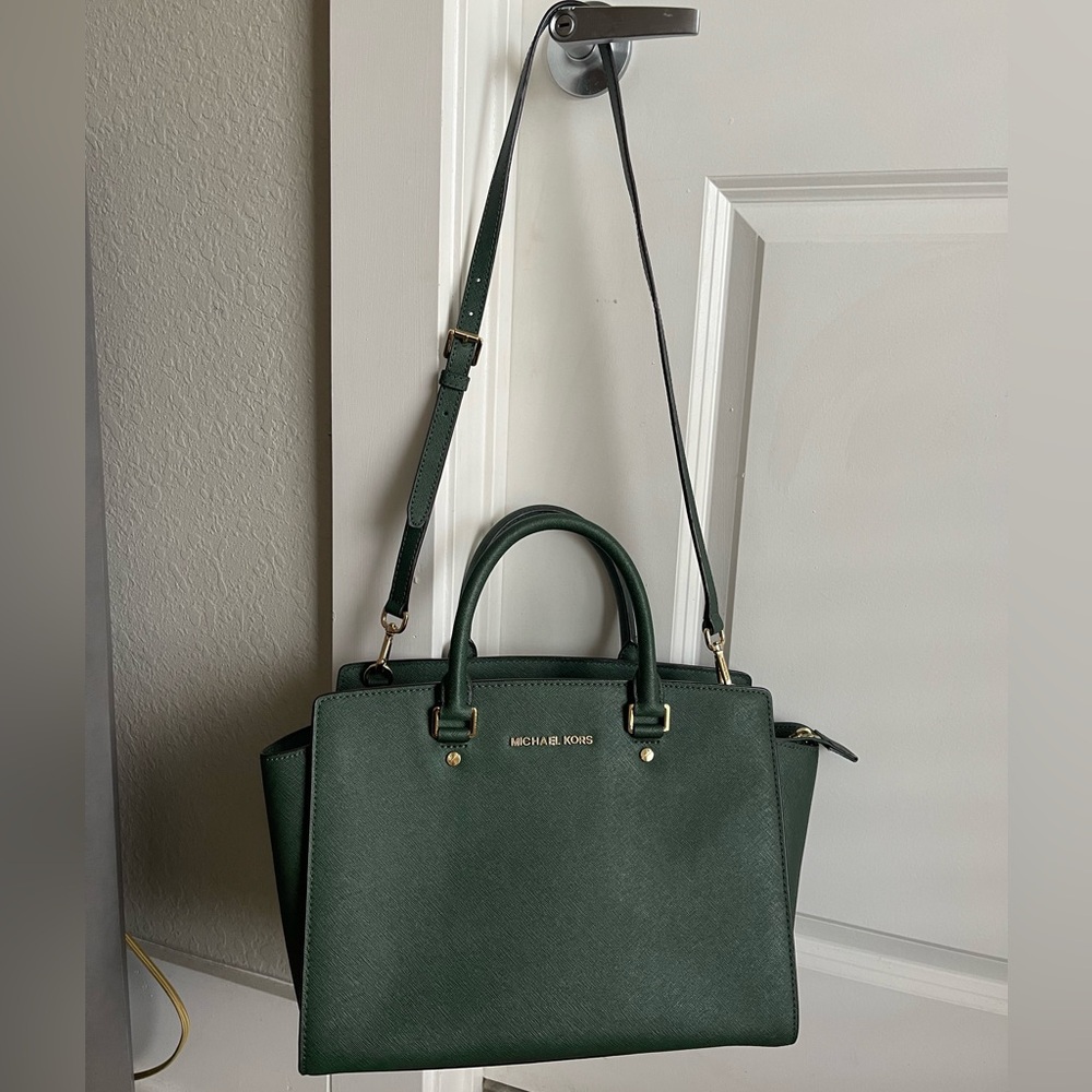 Dark green Michael Kors top handle and long strap structured tote